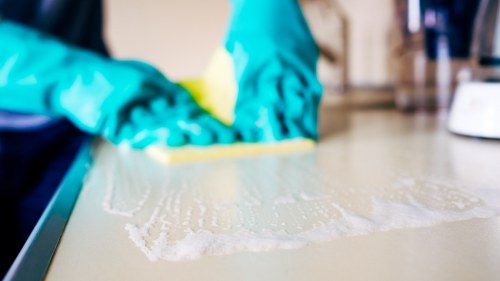 Detailed cleaning of kitchen surfaces and appliances in Wembley